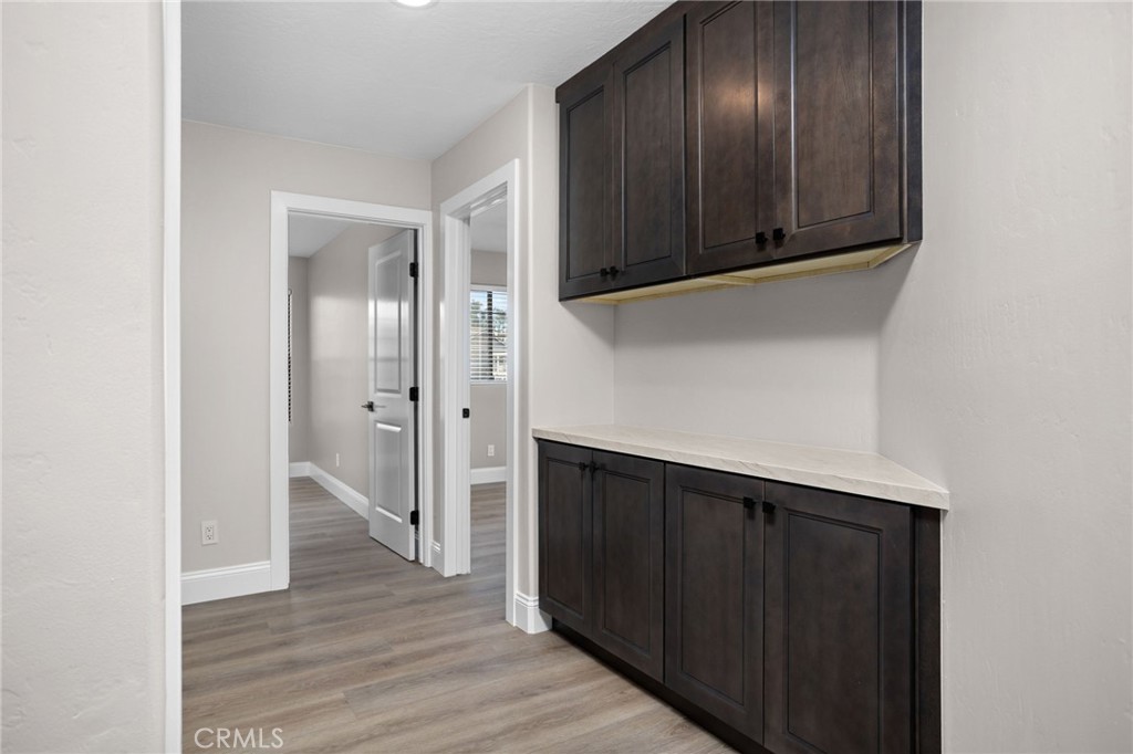 29566 Big Range Road, Unit 1 Canyon Lake, CA 92587 - Photo 30 of 55 a view of hallway with wooden floor