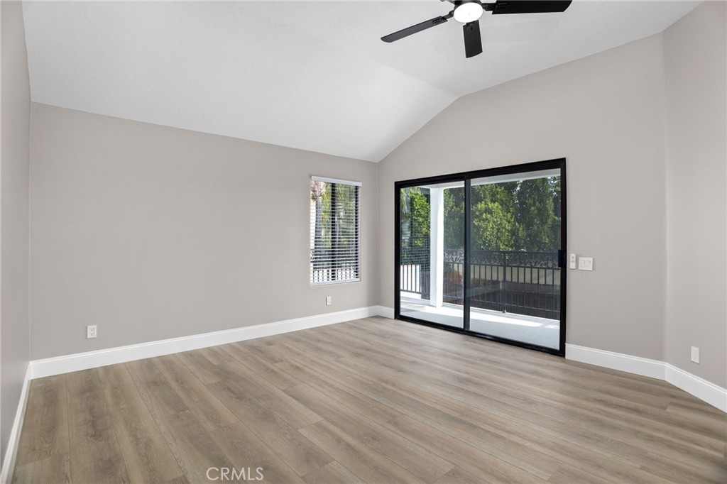 29566 Big Range Road, Unit 1 Canyon Lake, CA 92587 - Photo 35 of 55 wooden floor in an empty room with a window