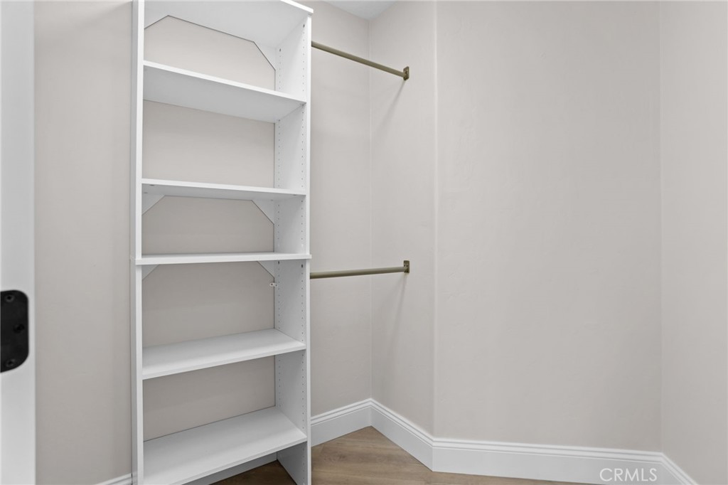 29566 Big Range Road, Unit 1 Canyon Lake, CA 92587 - Photo 41 of 55 a view of walk in closet with empty racks