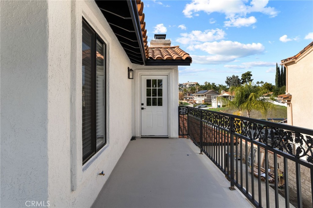 29566 Big Range Road, Unit 1 Canyon Lake, CA 92587 - Photo 44 of 55 a view of a balcony with wooden floor