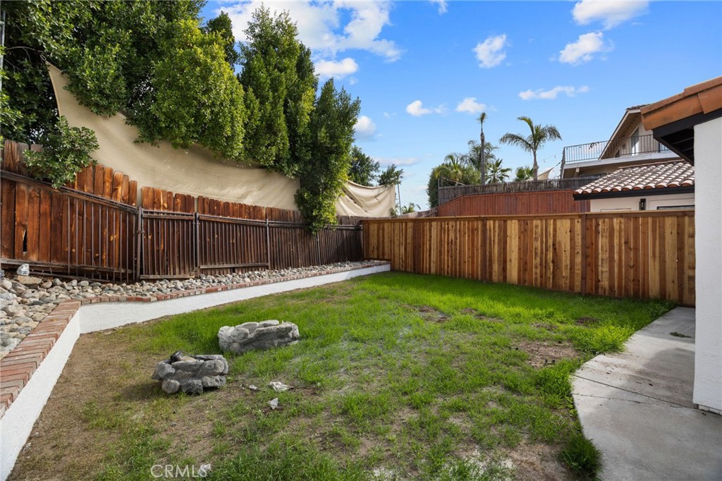 29566 Big Range Road, Unit 1 Canyon Lake, CA 92587 - Photo 46 of 55 a swimming pool with wooden fence
