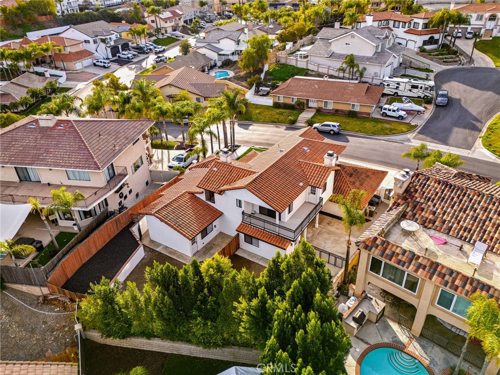 29566 Big Range Road, Unit 1 Canyon Lake, CA 92587 - Photo 53 of 55 an aerial view of a swimming pool with outdoor seating