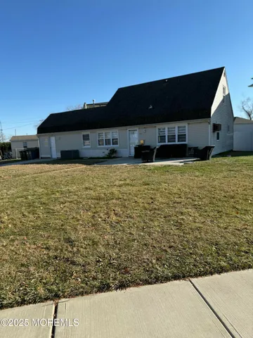 a view of house with ocean view