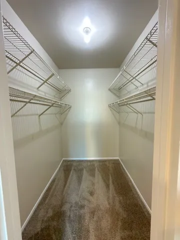 a view of a room with racks on the wall