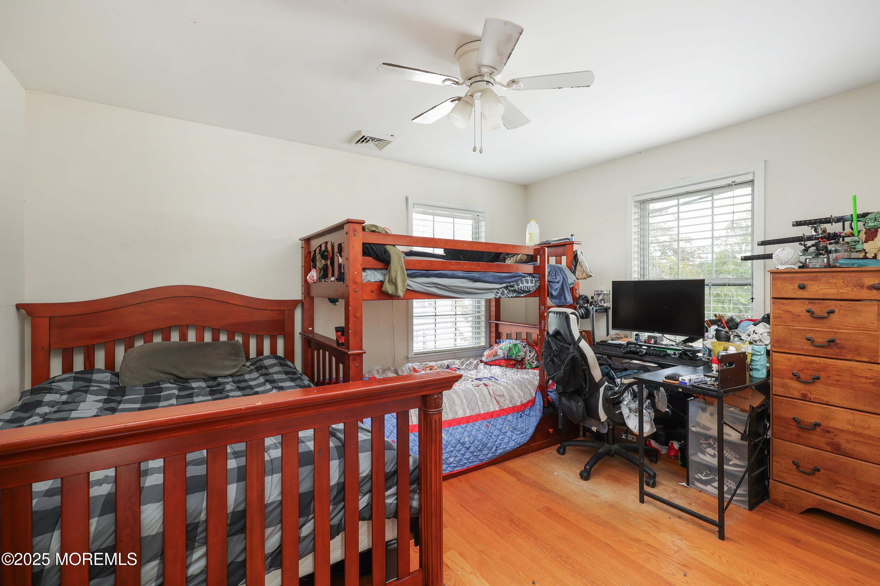 280 Linden Avenue Middletown, NJ 07748 - Photo 15 of 17 a bedroom with furniture and a window