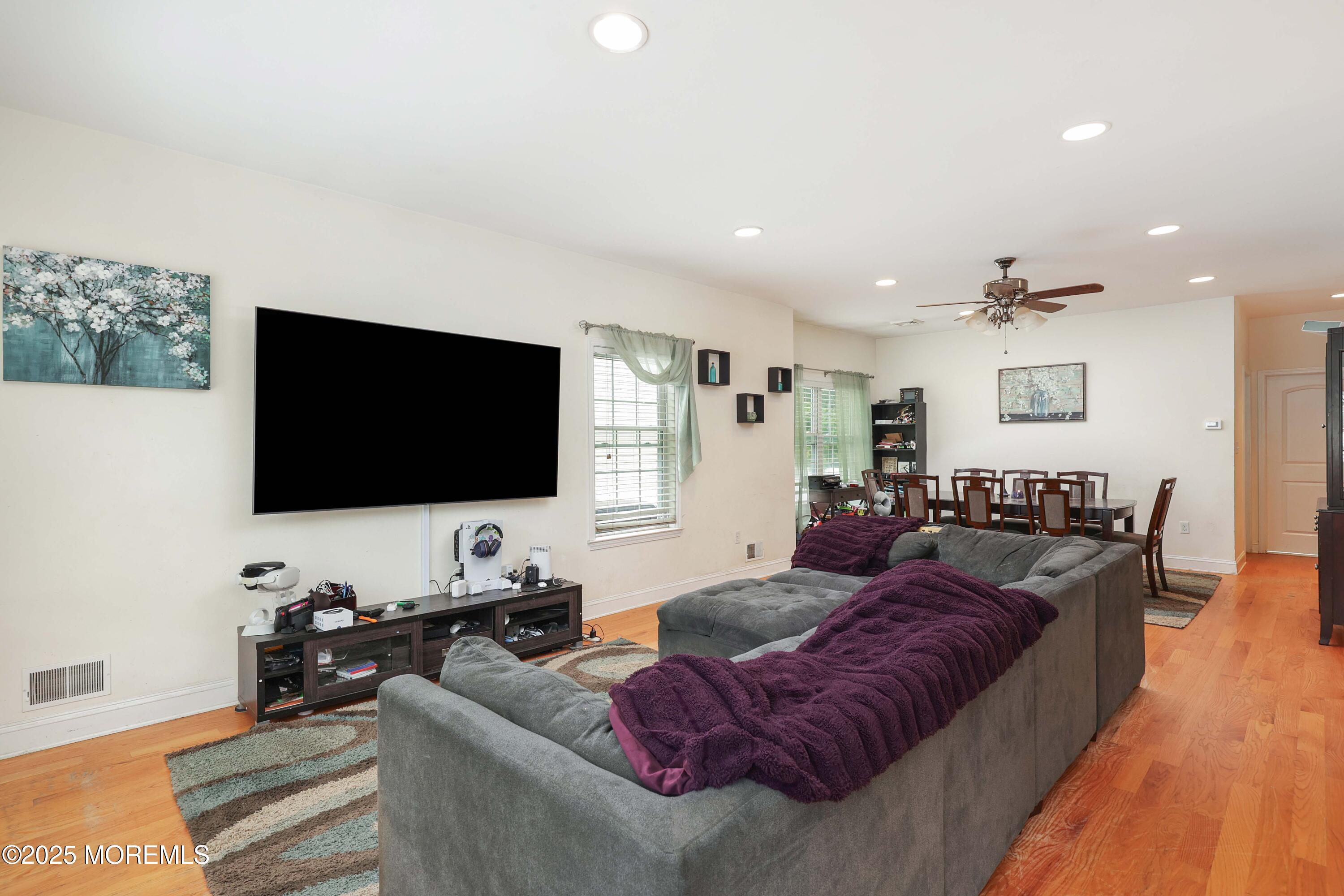 280 Linden Avenue Middletown, NJ 07748 - Photo 6 of 17 a living room with furniture and a flat screen tv