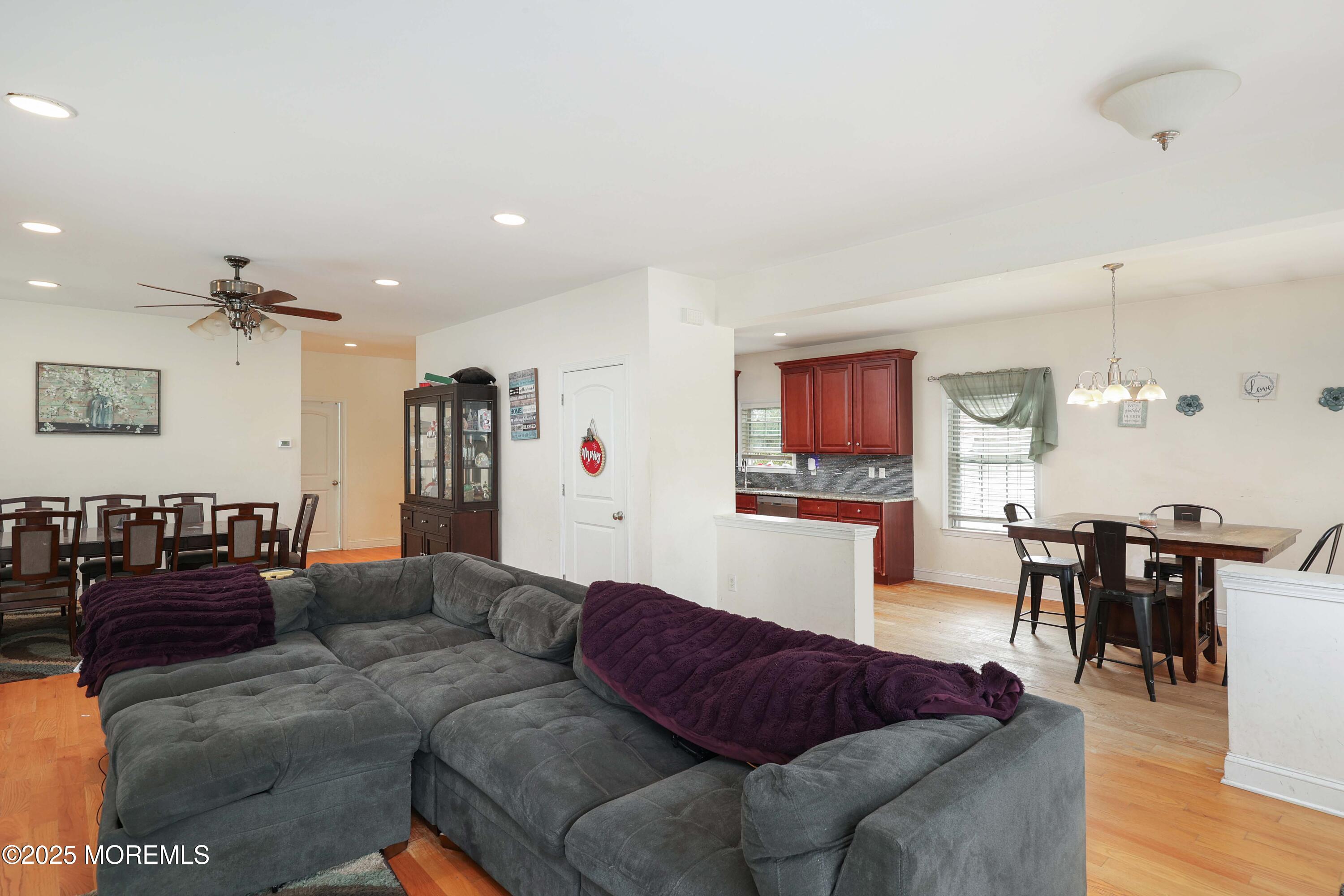 280 Linden Avenue Middletown, NJ 07748 - Photo 8 of 17 a living room with furniture and wooden floor