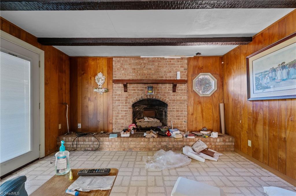 7530 Adler Road Summerfield, NC 27358 - Photo 11 of 31 Fireplace - Unsure if it's in working condition.