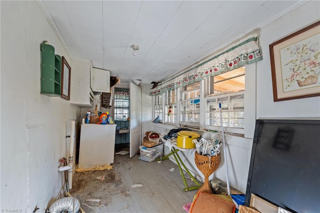 7530 Adler Road Summerfield, NC 27358 - Photo 20 of 31 Laundry Room - This is NOT 7ft ceilings.