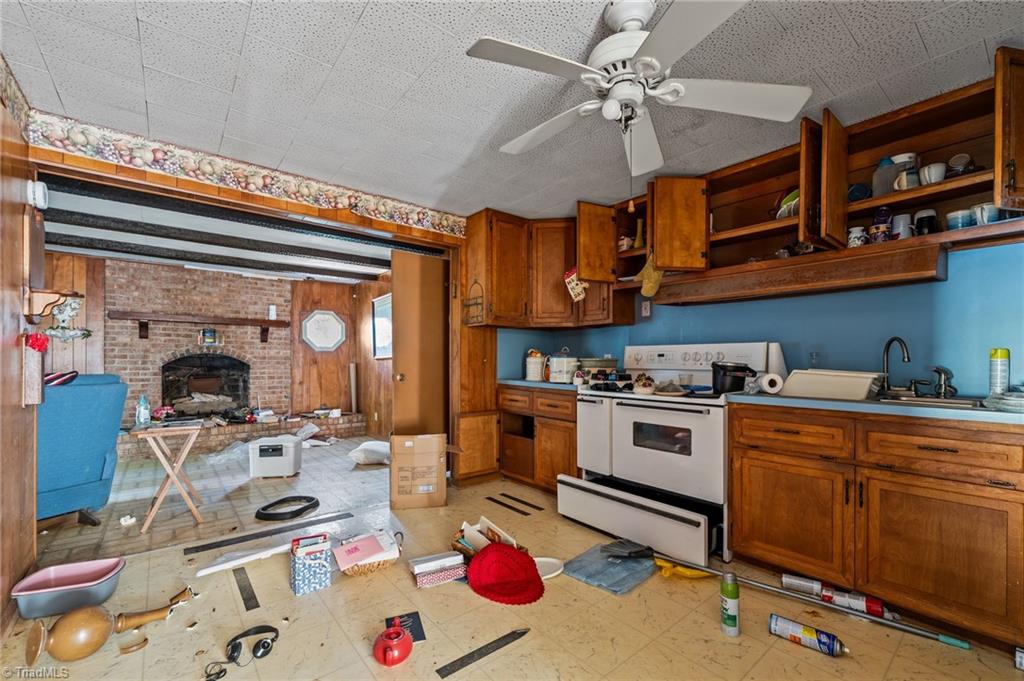7530 Adler Road Summerfield, NC 27358 - Photo 9 of 31 Kitchen Flows into Dining Room
