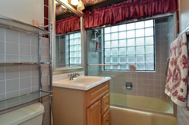 a bathroom with a sink and a bathtub