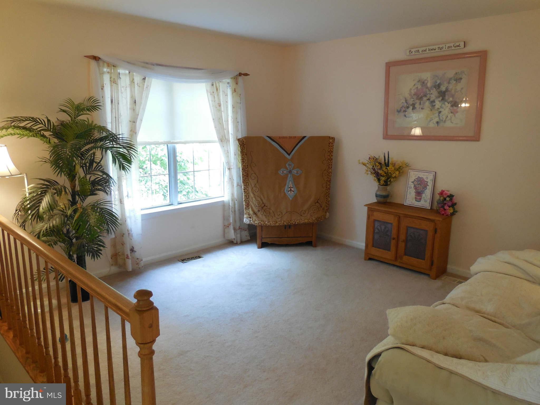 300 Rugby Road Fredericksburg, VA 22406 - Photo 10 of 29 a living room with furniture and a window