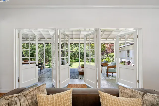 a outdoor living space with furniture and garden view