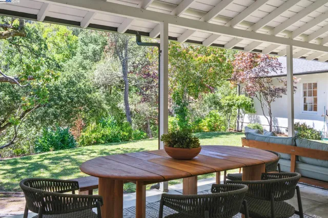 a spacious bedroom with a bed and a couch