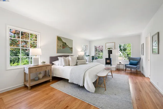 a white bath tub sitting next to a window