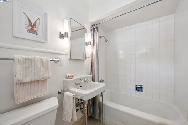 a view of living room with furniture and window