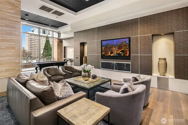 a living room with furniture and a flat screen tv