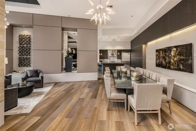 a view of a dining room with furniture and wooden floor