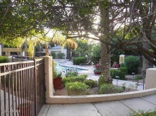 a room with gym equipment and windows