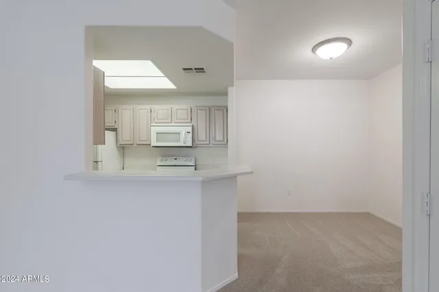 a view of a sink and a mirror