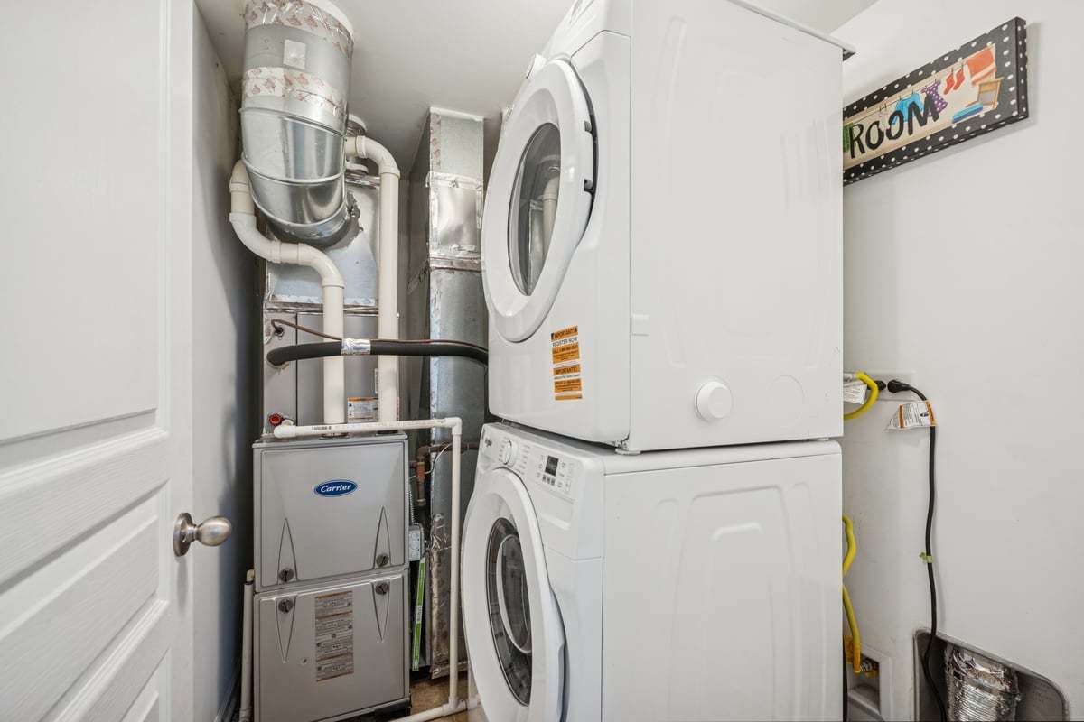 1701 Windward Drive Pingree Grove, IL 60140 - Photo 17 of 19 a utility room with dryer and washer
