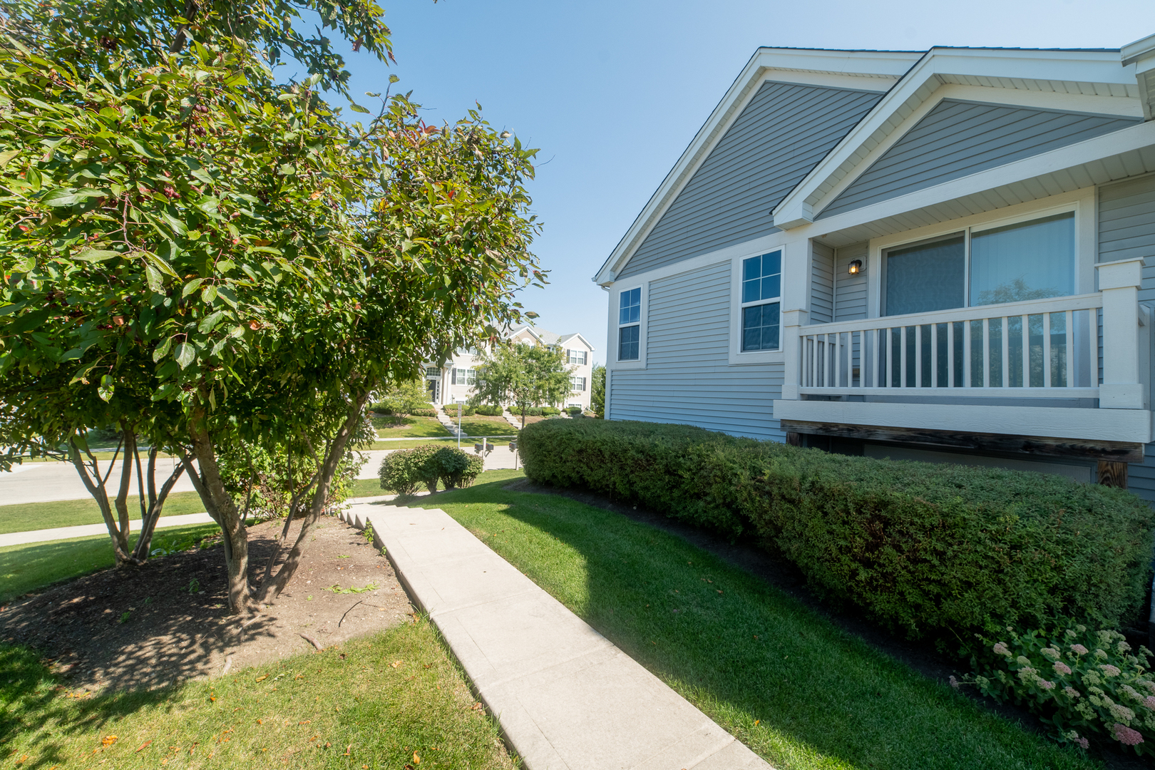 1701 Windward Drive Pingree Grove, IL 60140 - Photo 2 of 19 a view of a house with a yard