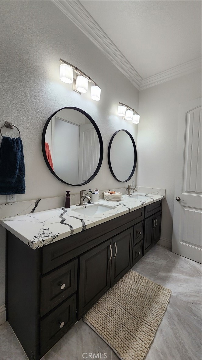 20243 Lee Road Perris, CA 92570 - Photo 35 of 75 a bathroom with a double vanity sink and a mirror