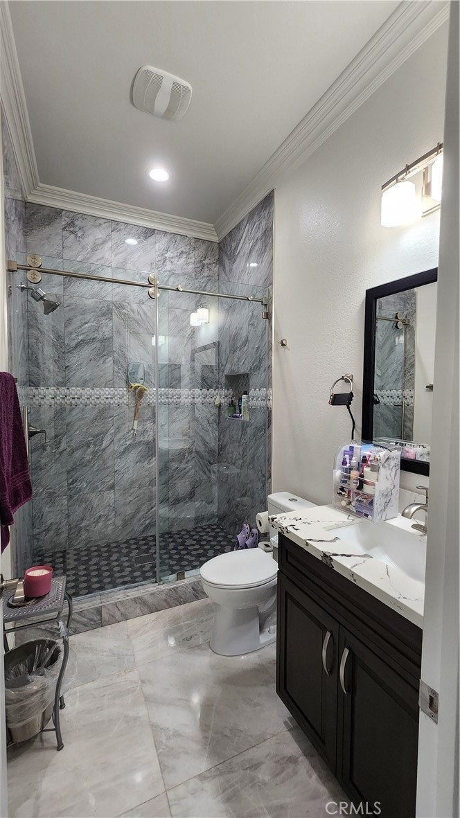 20243 Lee Road Perris, CA 92570 - Photo 40 of 75 a bathroom with a sink mirror and a shower