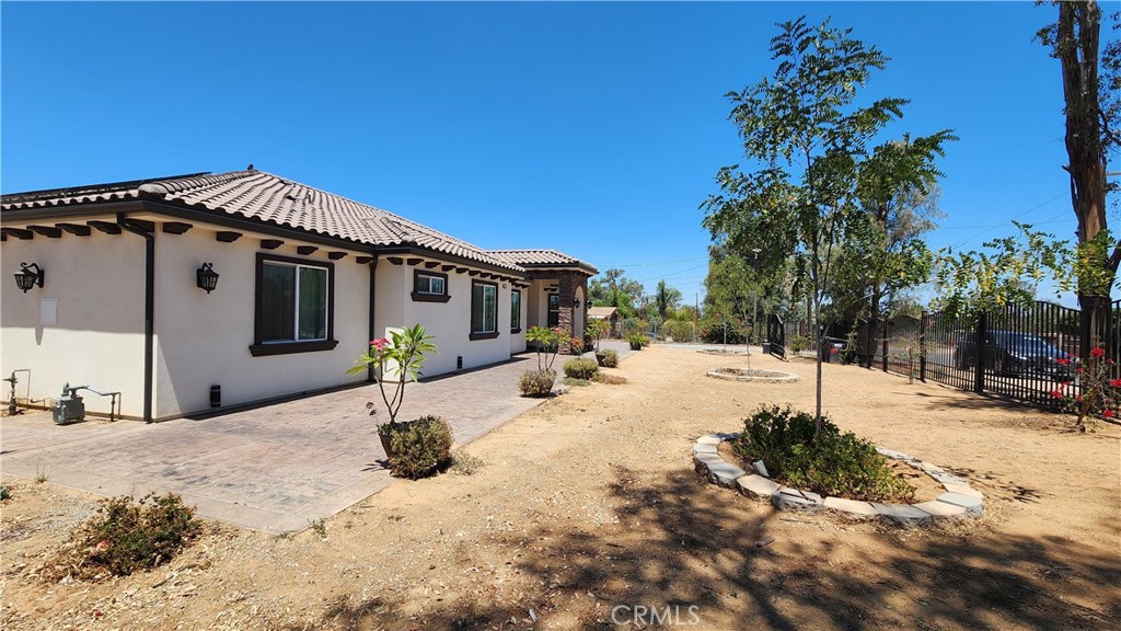 20243 Lee Road Perris, CA 92570 - Photo 5 of 75 a view of a backyard of the house