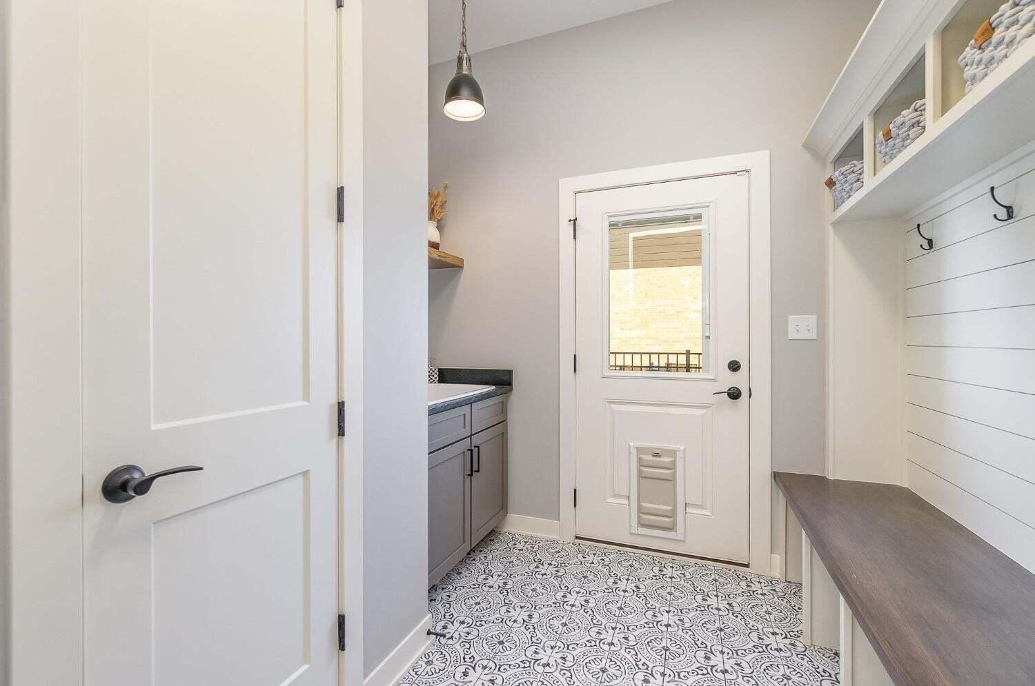 16617 Noble Street Lowell, IN 46356 - Photo 14 of 32 a view of a bathroom with a sink and a mirror