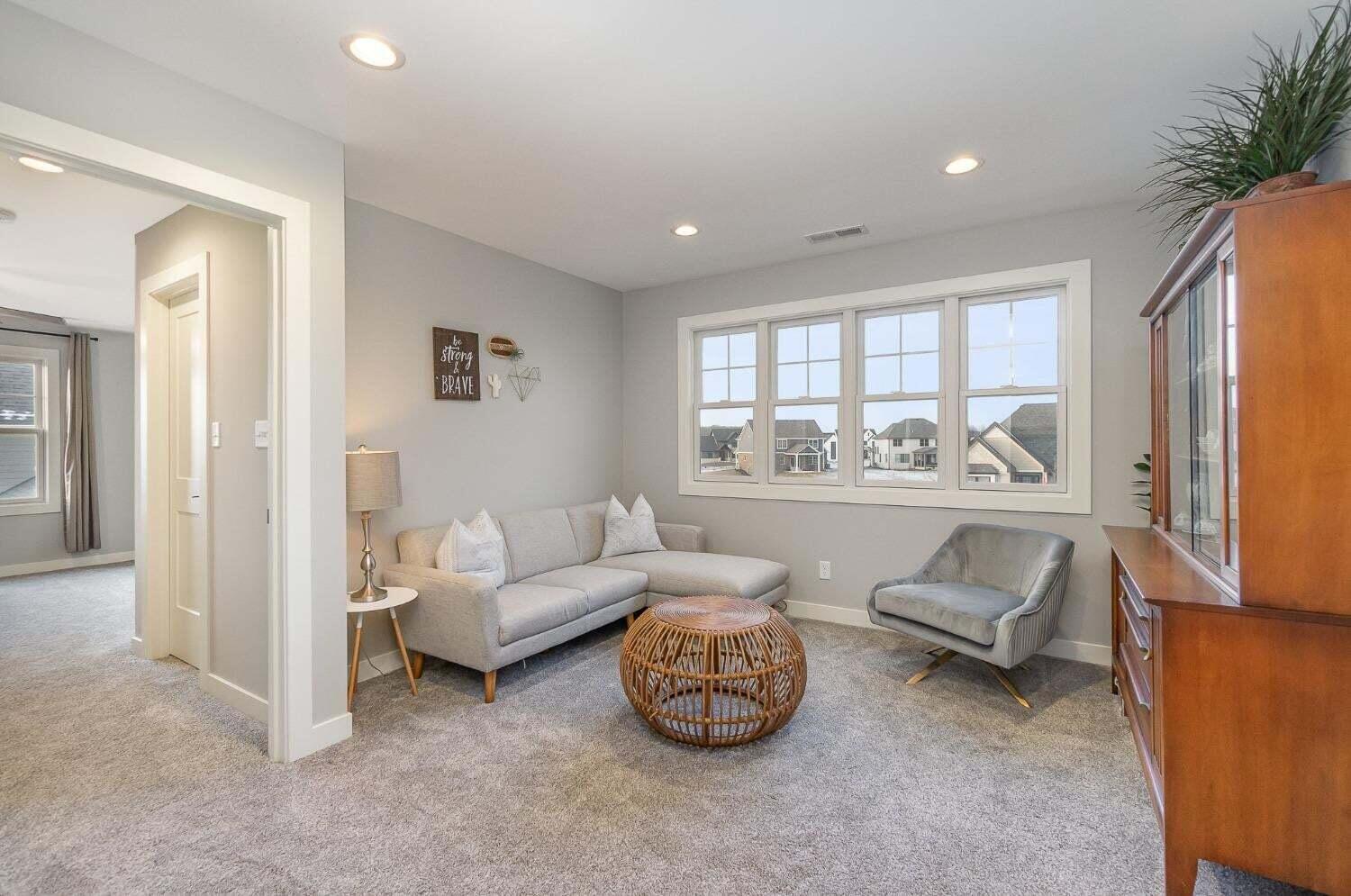 16617 Noble Street Lowell, IN 46356 - Photo 17 of 32 a living room with furniture and a window