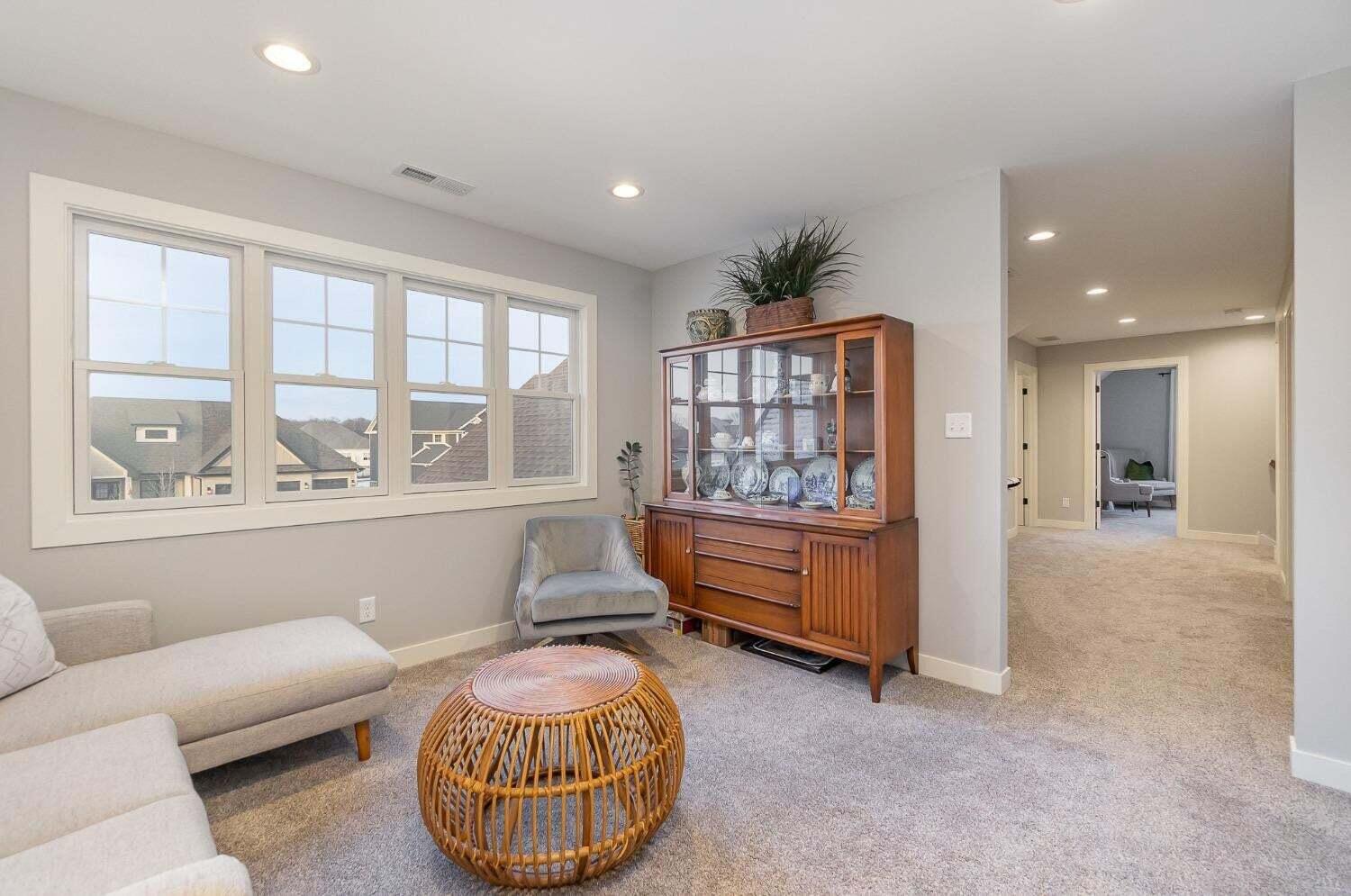 16617 Noble Street Lowell, IN 46356 - Photo 18 of 32 a living room with furniture and a window