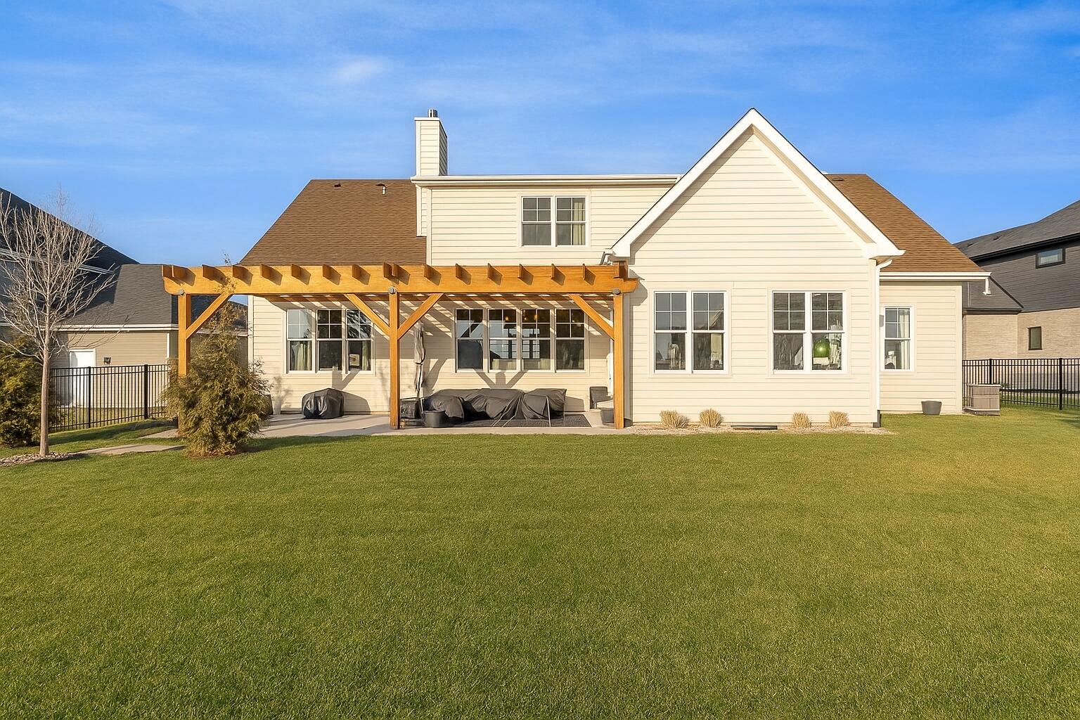16617 Noble Street Lowell, IN 46356 - Photo 2 of 32 a front view of a house with a garden
