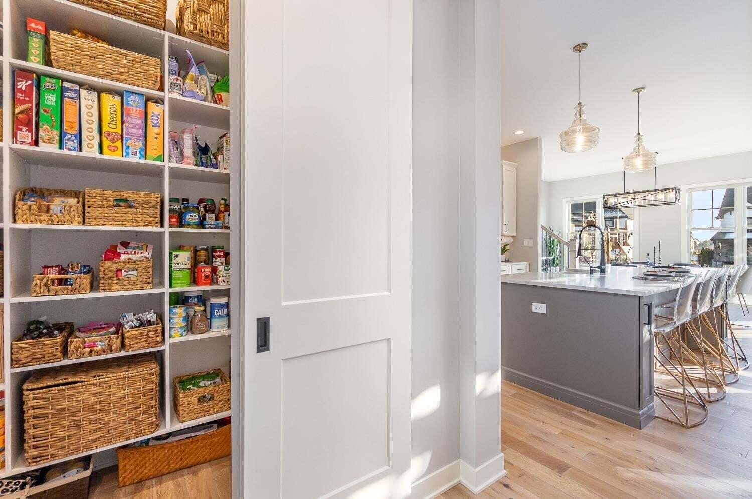16617 Noble Street Lowell, IN 46356 - Photo 10 of 32 a room with a book shelf and a wooden floor
