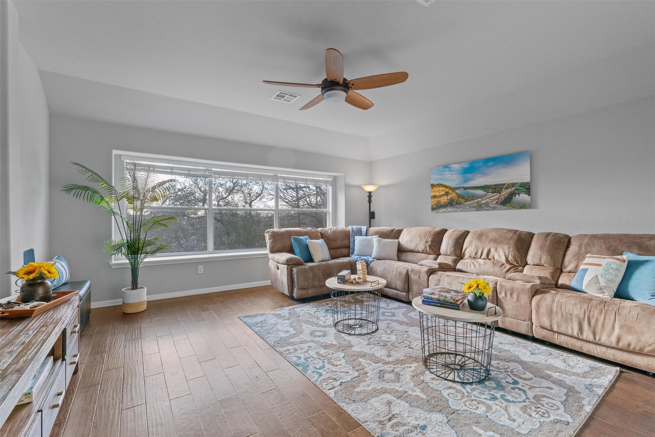 3736 Cerulean Way Round Rock, TX 78681 - Photo 17 of 36 Living room with a ceiling fan and wood finished floors