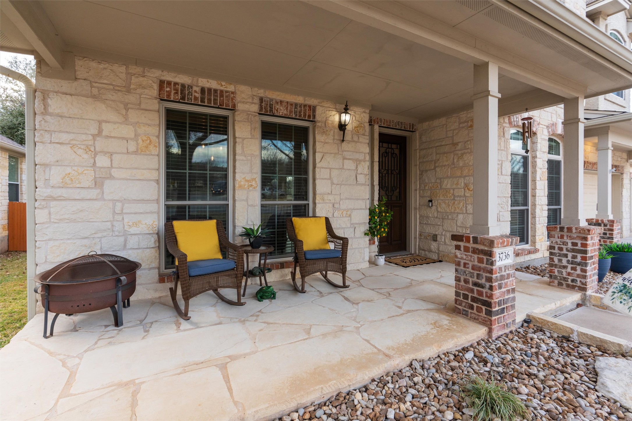3736 Cerulean Way Round Rock, TX 78681 - Photo 5 of 36 Covered porch with a fire pit
