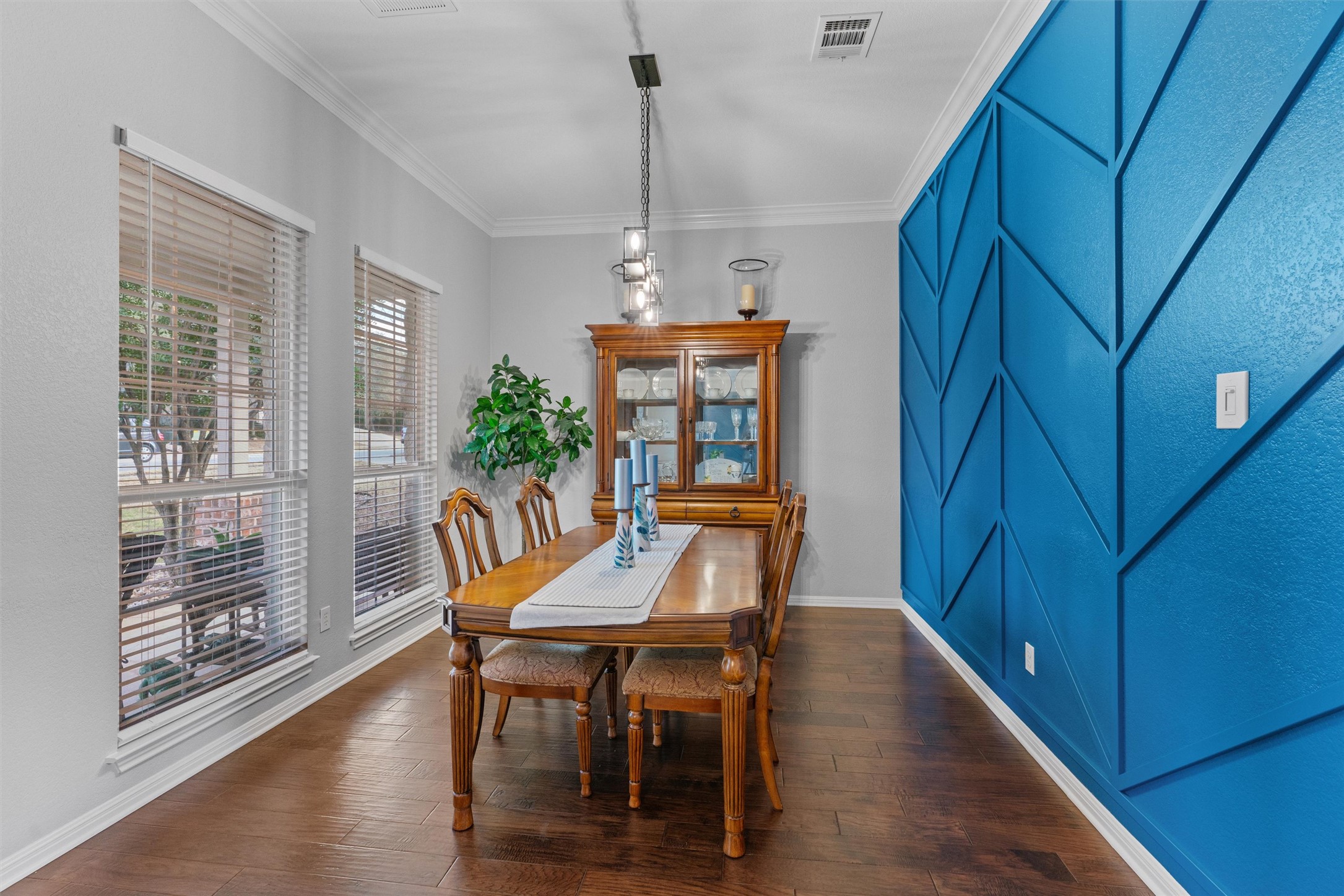 3736 Cerulean Way Round Rock, TX 78681 - Photo 7 of 36 Dining area with dark wood-style floors and ornamental molding