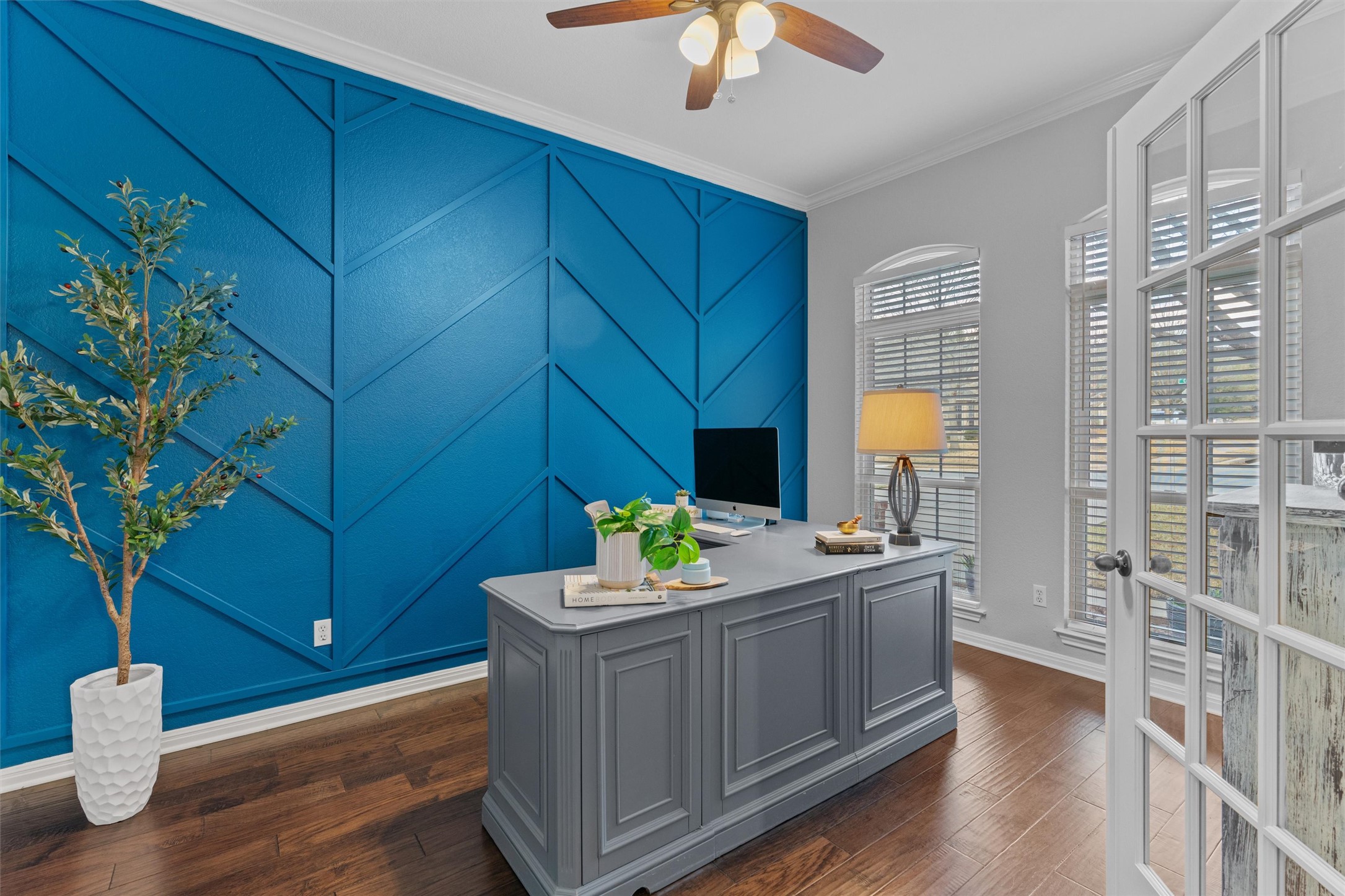 3736 Cerulean Way Round Rock, TX 78681 - Photo 8 of 36 Home office featuring an accent wall, crown molding, dark wood finished floors, a decorative wall, and ceiling fan