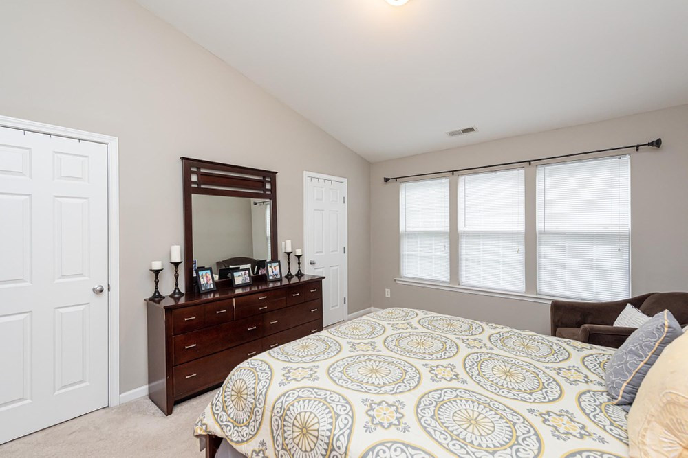 8451 Reedy Ridge Lane Raleigh, NC 27613 - Photo 13 of 30 Bedroom features His and Hers walk-in closets. Master Bedroom
