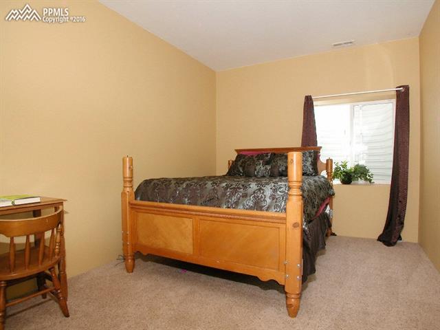 12153 Rio Secco Road Peyton, CO 80831 - Photo 16 of 26 Lower level bedroom #3