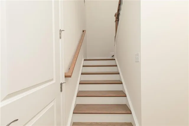 a view of staircase with white walls and white walls