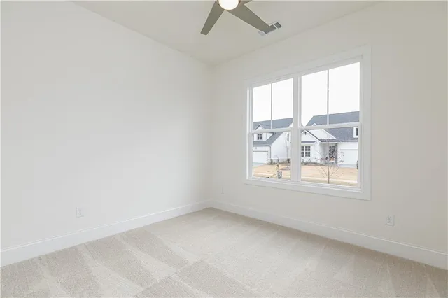 a kitchen with cabinets and appliances