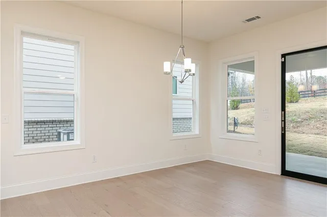 an empty room that has a window