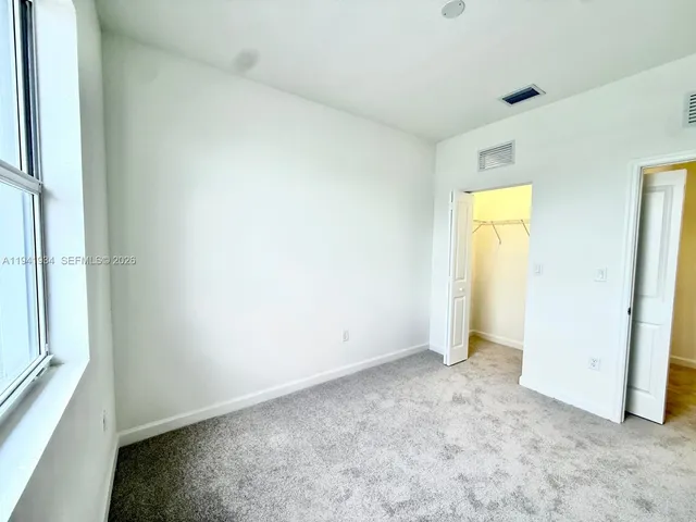 an empty room with a window