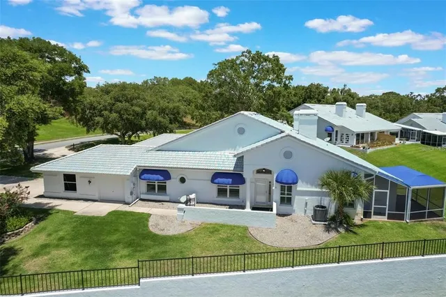 a view of house with yard entertaining space
