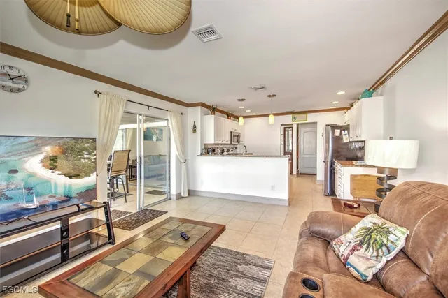 a living room with furniture and a table