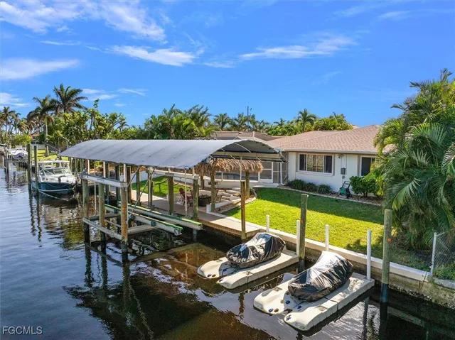 an outdoor space with furniture and city view
