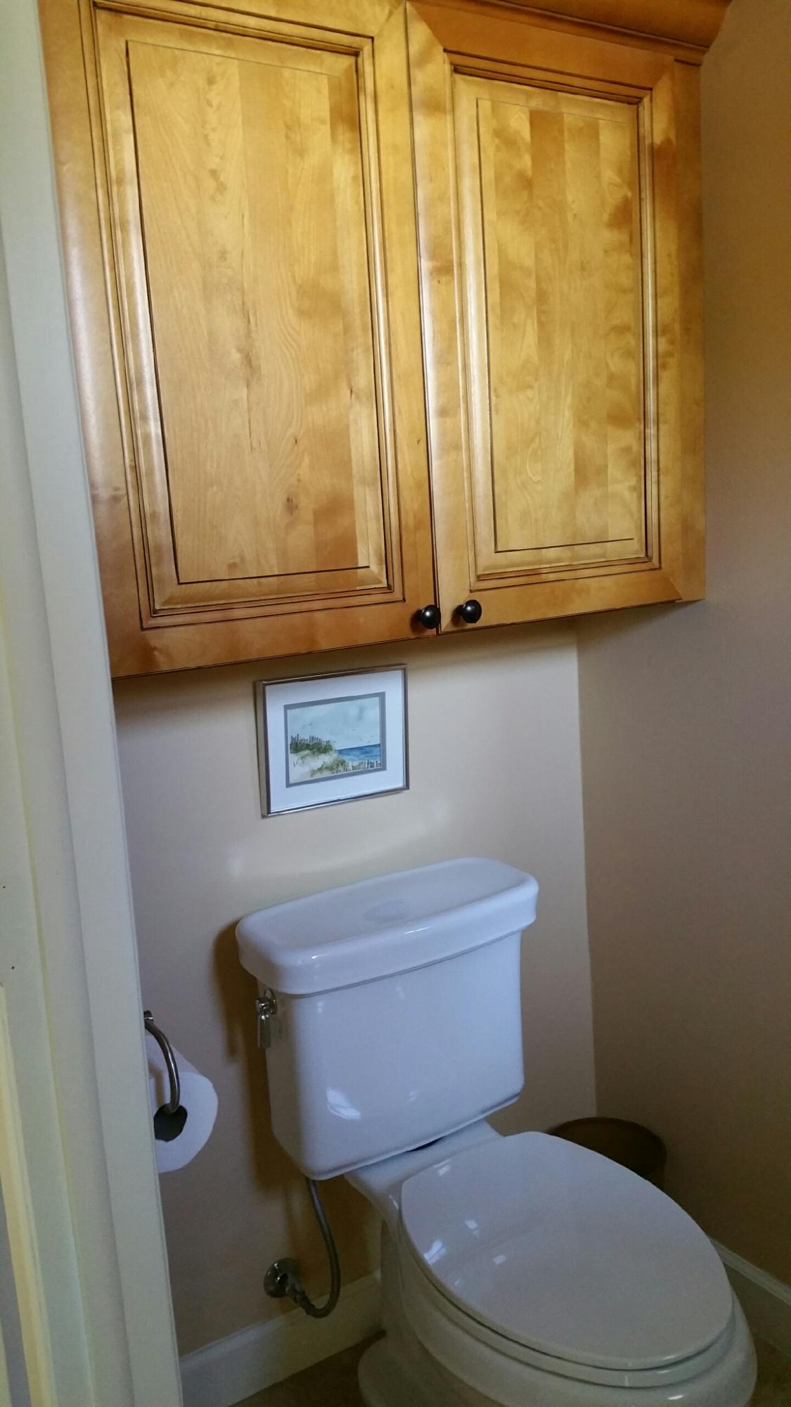 8904 Southwest 22nd Street, Unit H Boca Raton, FL 33433 - Photo 14 of 30 a bathroom with a toilet a sink and a window