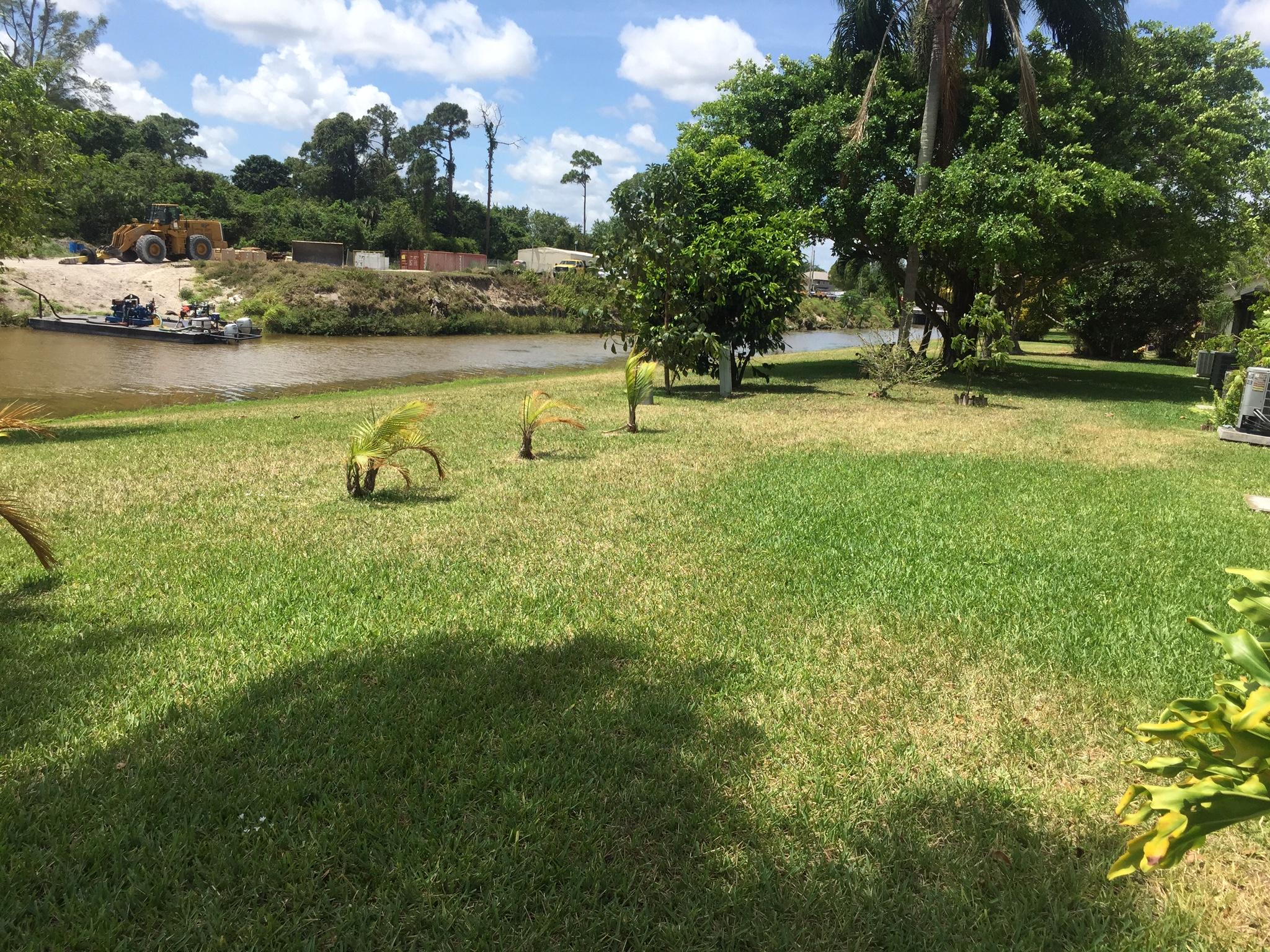 8904 Southwest 22nd Street, Unit H Boca Raton, FL 33433 - Photo 25 of 30 a view of a lake with houses in the back