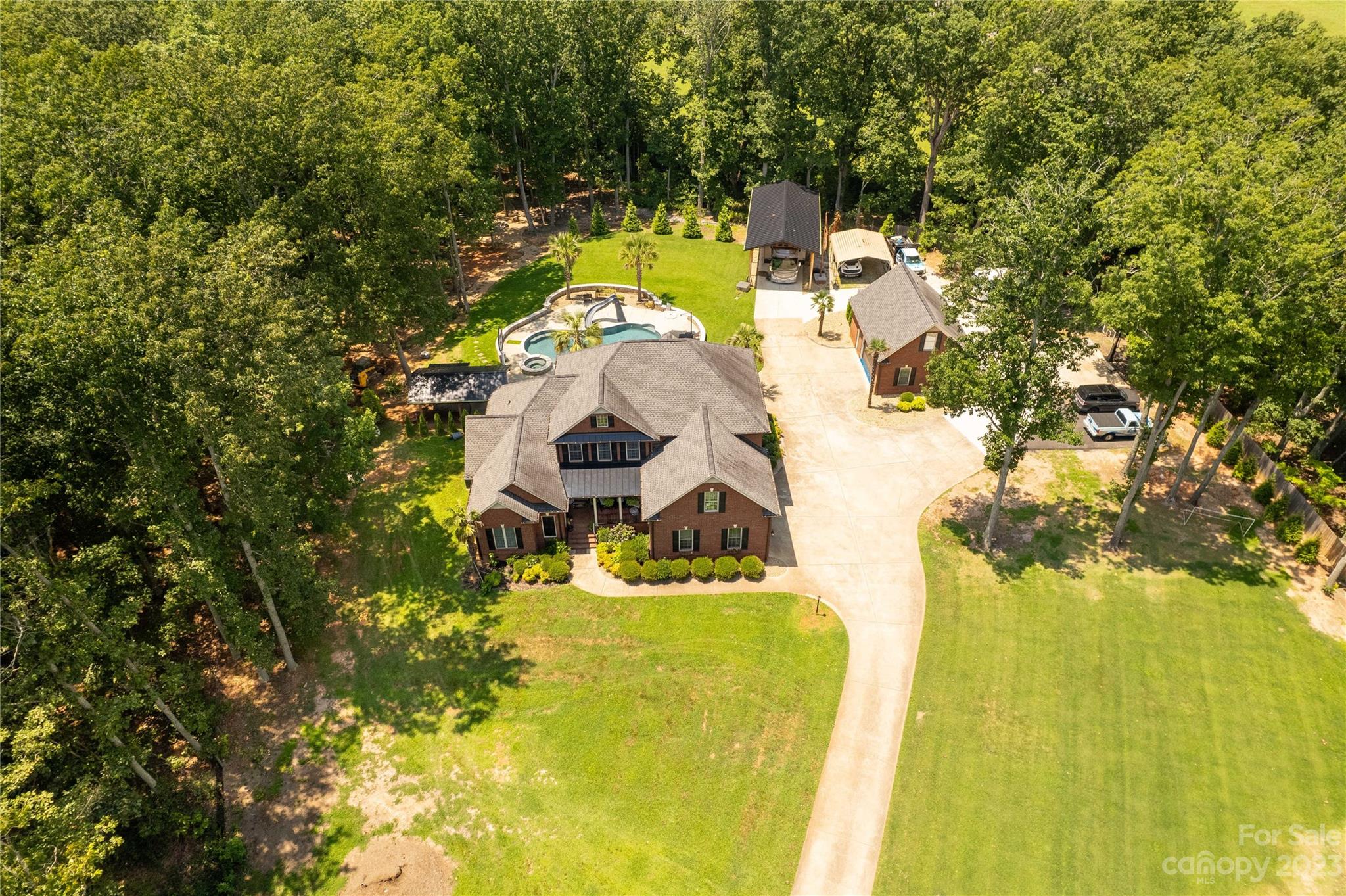 100 Generals Way Clover, SC 29710 - Photo 6 of 48 a view of swimming pool with seating area